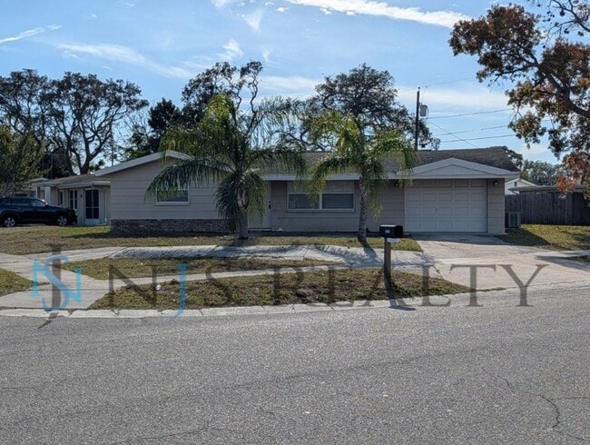 Photo - This 3/2/1 with over 1100 sq ft offers all tile floors open kitchen/dining, split floor plan on a...