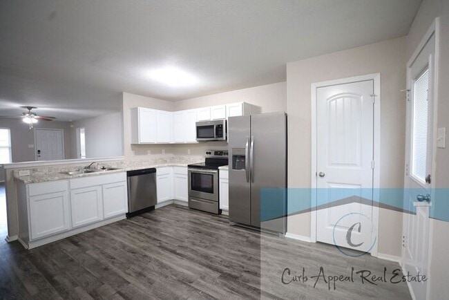 Photo - Move in special $825!!! Spacious 4 bed 2 b...