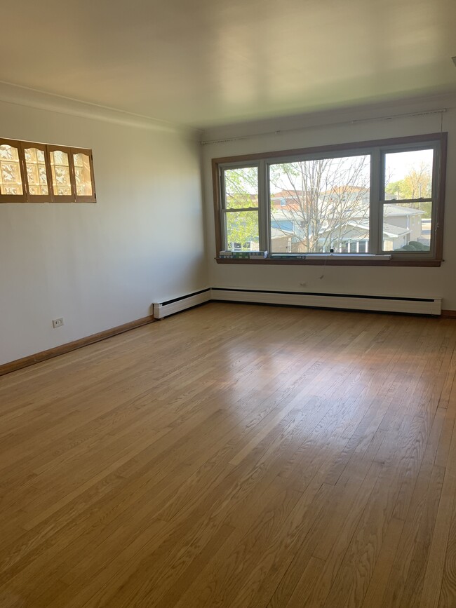 Living Room - 5015 Crain St Apartments Unit 2