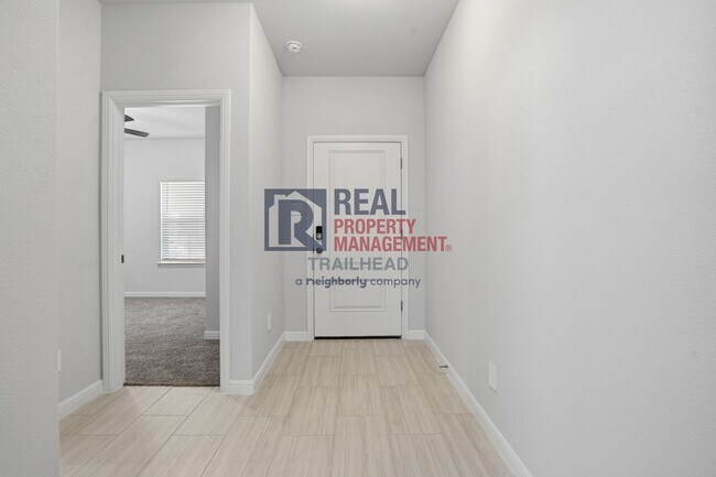 Photo - Inviting 4-Bedroom Layout with Flexible Living Areas