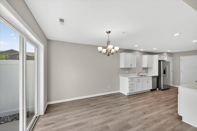 Photo - New construction end-unit townhome in Zimm...