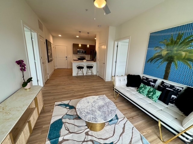 Living Room into Kitchen - The Oasis Rental