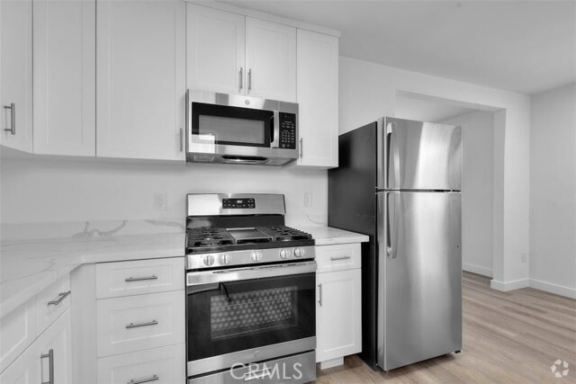 Building Photo - 908 Manhattan Ave Unit B Rental