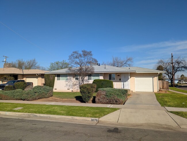 Building Photo - Updated 3 bedroom 2 bathroom home with large backyard, corner lot, close to shopping and schools ...