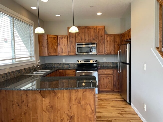 Photo - Gorgeous End-Unit Townhome Backing to Open Space!