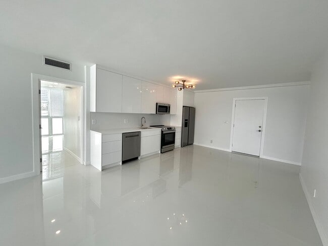 Photo - Fully Renovated East-Facing 2BR/2BA + Bonus Room | Ocean Views | In-Unit W/D Unit 401