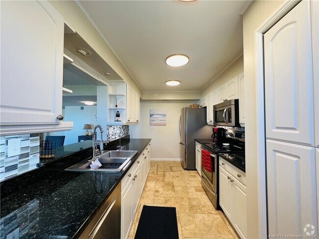 Building Photo - 10044 S Ocean Dr Unit 702 Rental