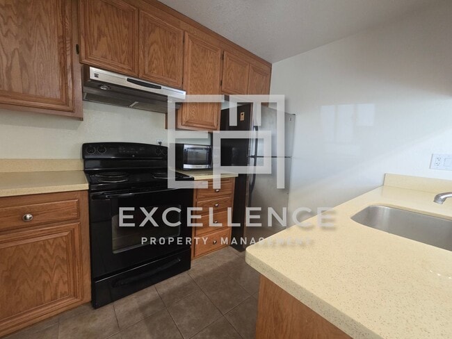 Photo - 2/1 With Updated Kitchen, Carport, Storage, Pool