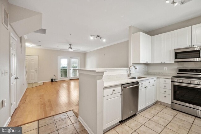 Photo - This townhouse style condo is located across the street from the Vienna Metro Station (Orange Line).