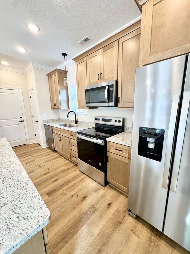 Photo - BEAUTIFUL BRAND NEW home!!! ??? 3 Bedrooms, 2.5 Baths with garage