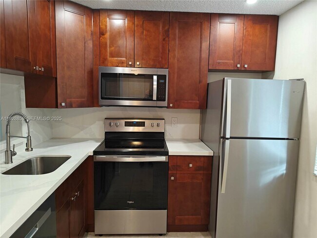 Photo - 8770 Royal Palm Blvd Unit 203-2