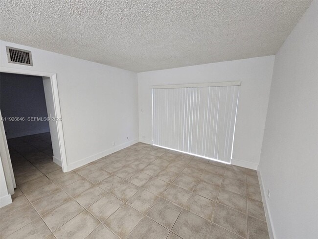 Photo - 3272 NW 102nd Terrace Unit 104-E