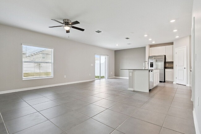 Photo - Spacious 4-Bed Retreat with 2.5 Baths in Davenport, FL – Your Next Rental Home Awaits!