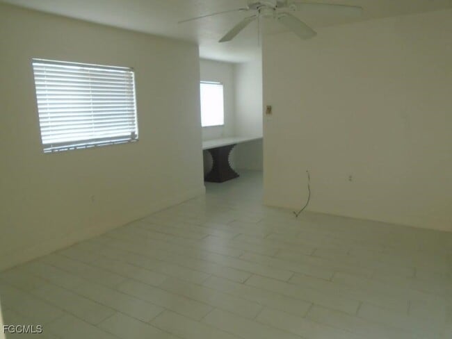 Building Photo - 8140 Country Rd Unit 101