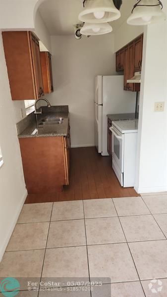 Building Photo - 7861 SW 10th St Unit B Rental