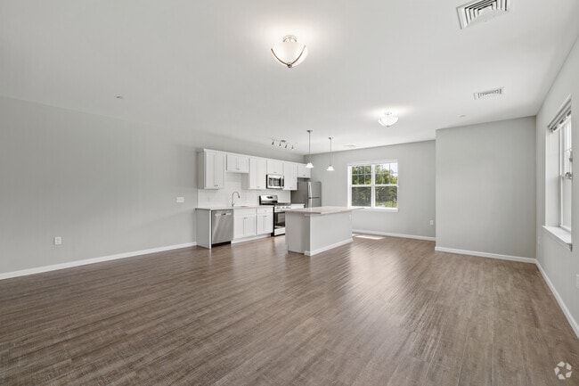 1BR, 1BA - 915SF - Living Room and Kitchen