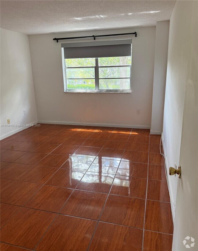 Building Photo - 8950 NE 8th Ave Unit 203 Rental