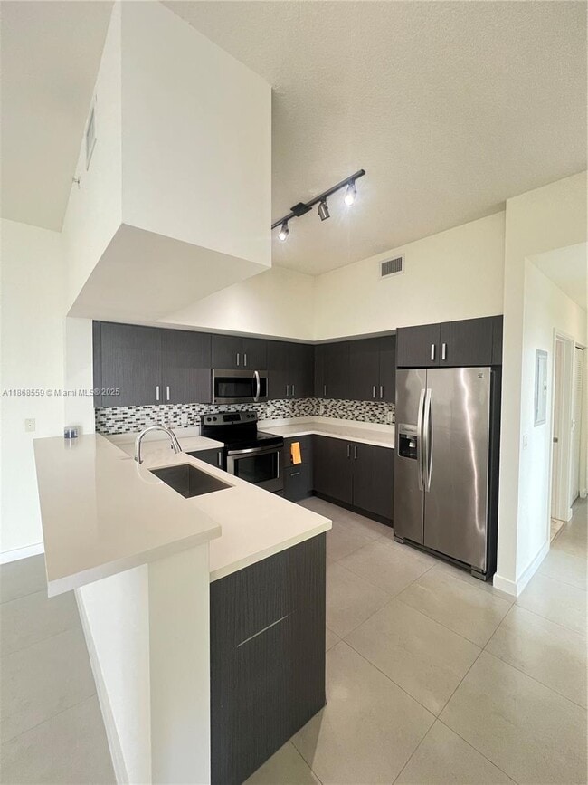 Photo - 729 NW 2nd St Apartamento Unidad 1225