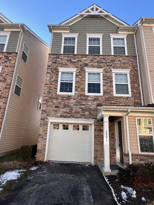 Front View - 2001 John Deere Ln Townhome