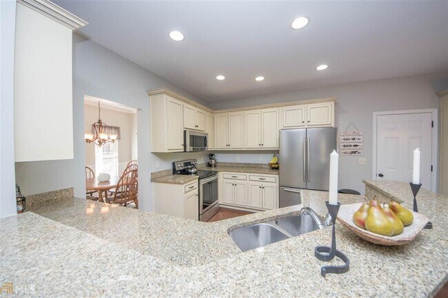 Photo - Hurry and show this 5 bedroom, 3 full bath home on a finished basement!!! Move in ready in desira...