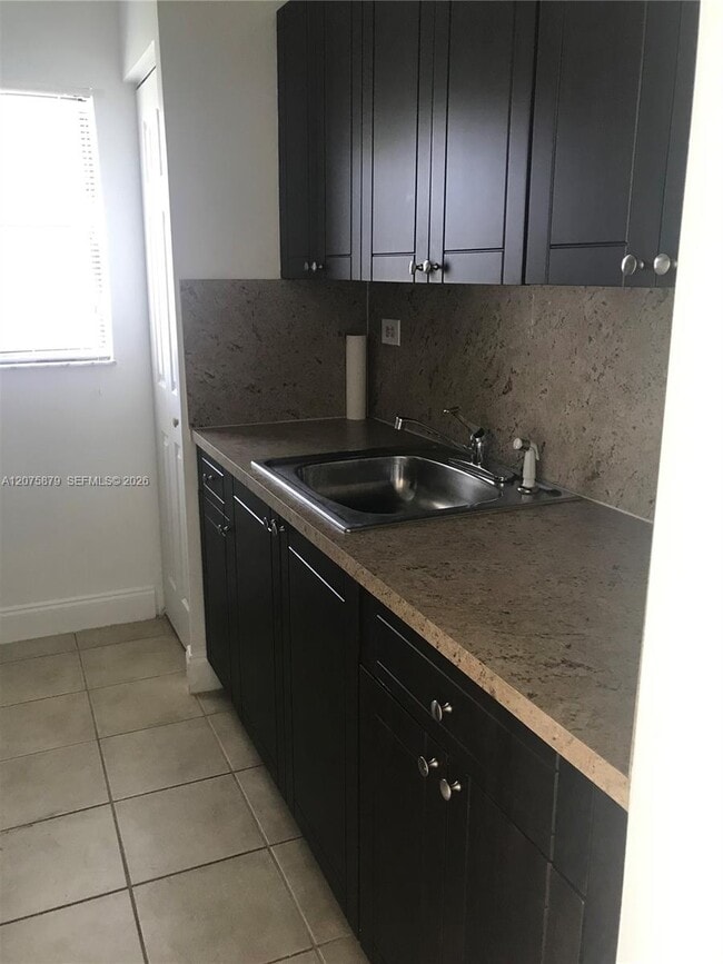 Building Photo - 7095 NW 179th St Unit 112