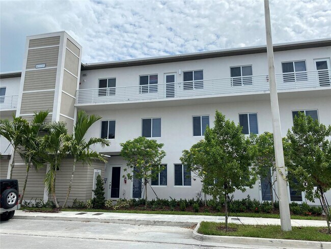 Photo - 6455 NW 103rd Pl Apartment Unit 303