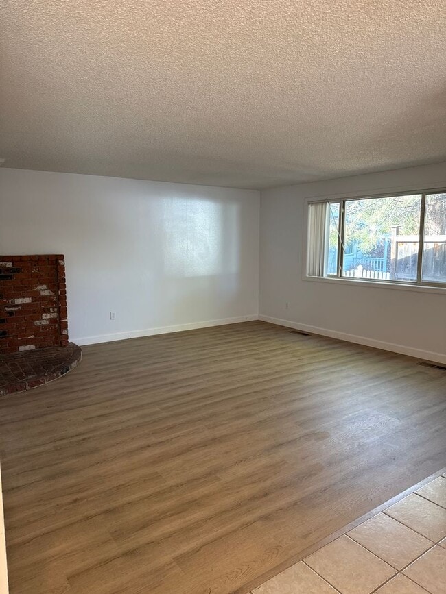 Photo - SE Home on Large Lot, New Luxury Vinyl Flooring & Paint, RV parking, Air Conditioning & Fenced