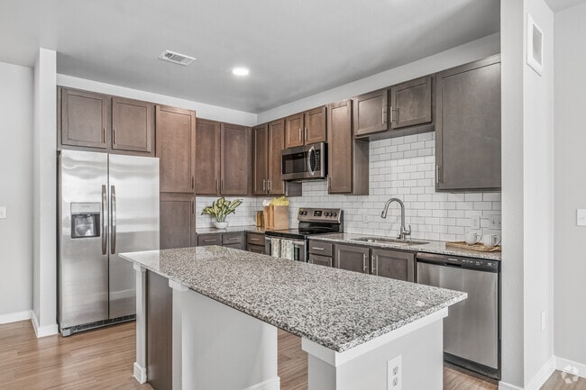 2BR, 2BA - 1,190SF - Kitchen - 55 Fifty at Northwest Crossing