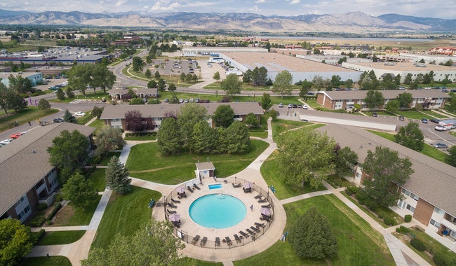 Take a dip in our community pool and hot tub - Meadow Creek Apartments