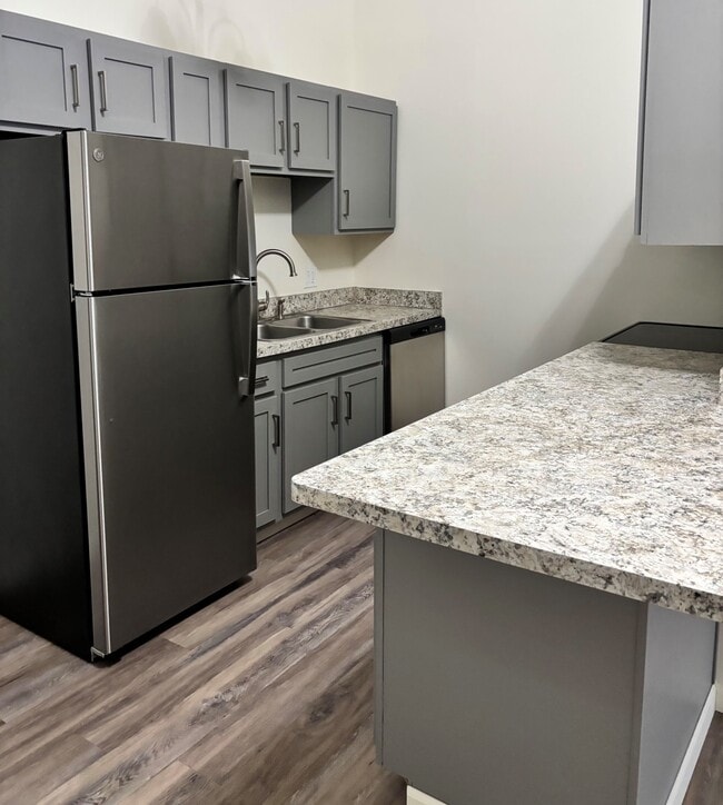 One Bedroom Loft Kitchen - Plum Brook Villas West