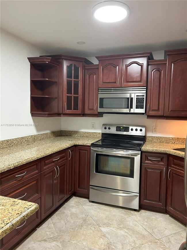 Building Photo - 3299 Cocoplum Cir Unit 3324 Rental