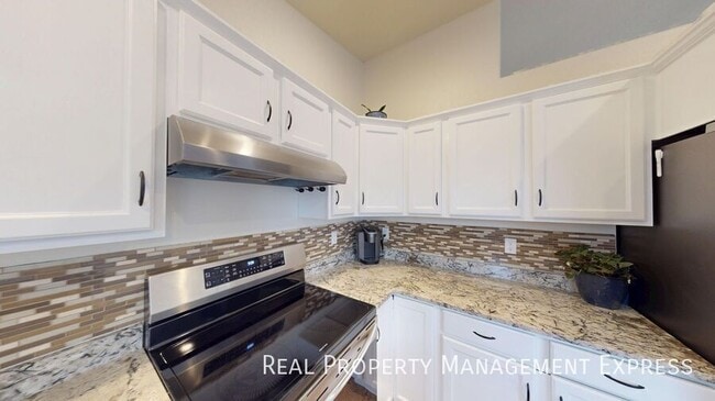 Photo - Stunning 4-Bedroom 2-Bathroom Home with Fully Fenced Yard