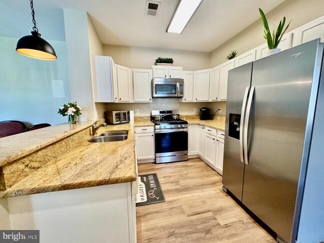Building Photo - 11501 Cardoness Ln Unit 101 Rental