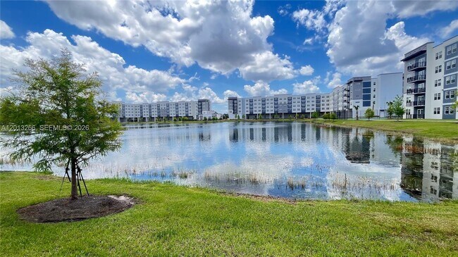 Building Photo - 5579 Millenia Park Blvd Unit # 318