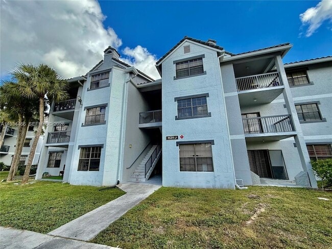 Building Photo - 11211 W Atlantic Blvd Unit 208