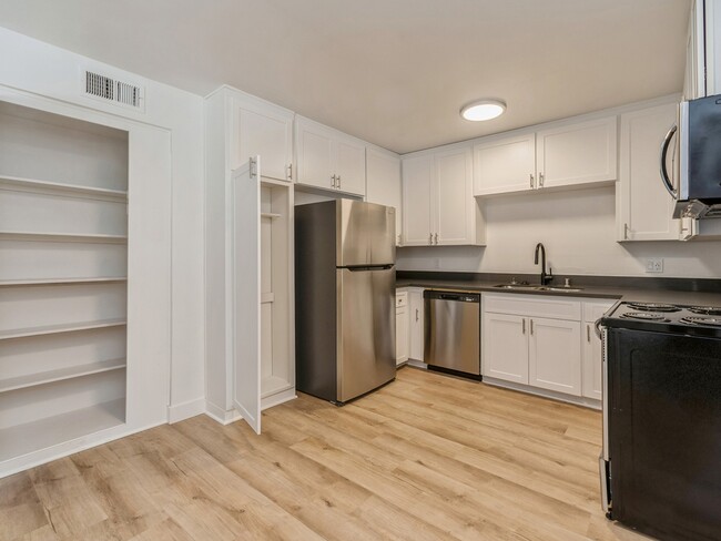 Interior-KitchenWithPantry - Palmilla Apartments