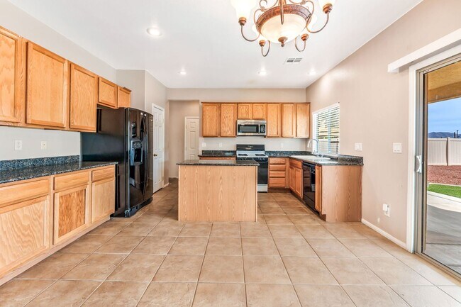 Photo - Stylish Two-Story Home with Loft and Dual Balconies in a Bright, Open Layout!