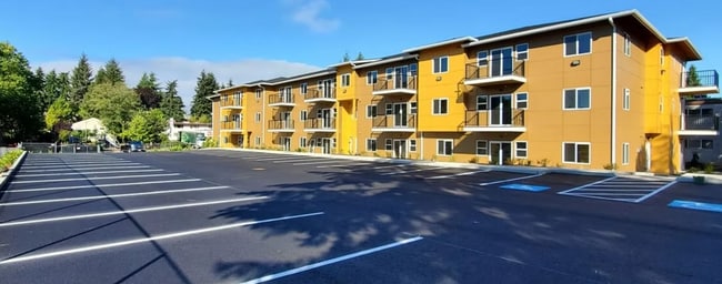 Building Photo - Spacious Two-Bedroom, Two-Bath Living at Marigold Apartments — Available Now Unit 103