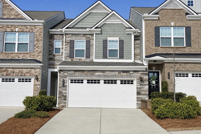 Building Photo - 3-bedroom Townhome in Buford City Schools with Quartz Kitchen, Private Suite, and Walkable Downto...