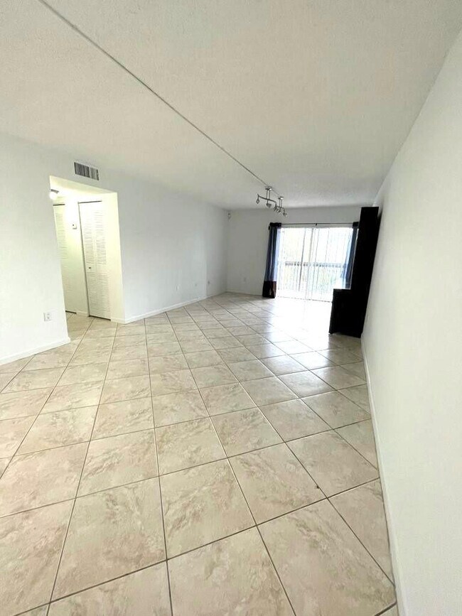 Photo - 711 N Pine Island Rd Unit 305