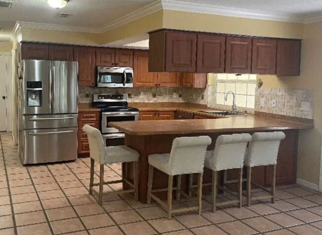 Photo - Welcome to this private retreat offering the perfect blend of luxury space and outdoor living.