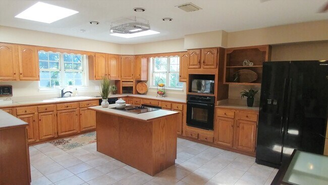 Photo - Large Executive Beauclerc Pool Home