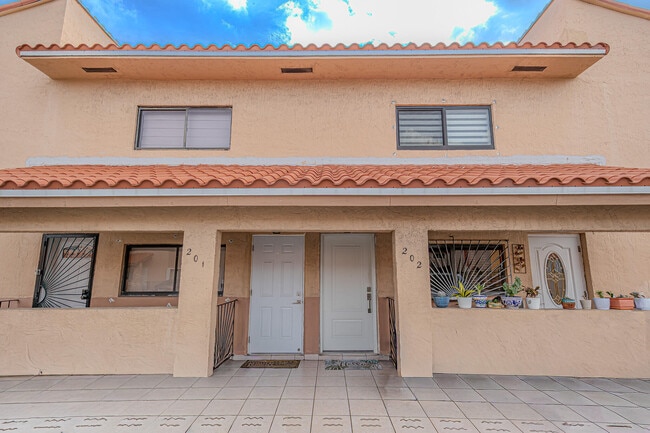 Building Photo - 7690 W 29th Way Unit 202