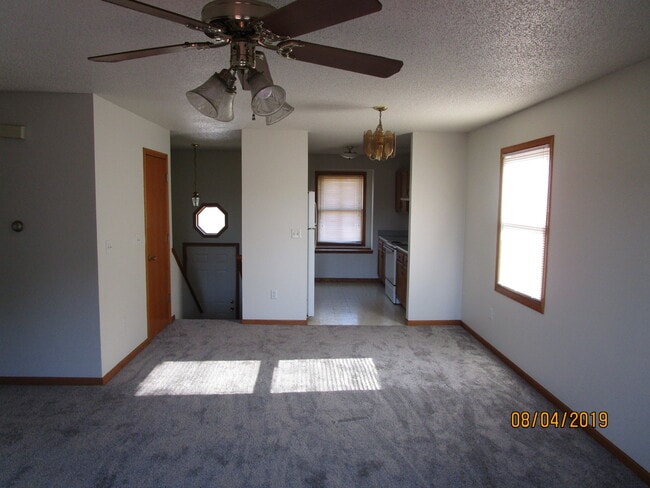 Living room with deck doors at your back - 2117 14th St