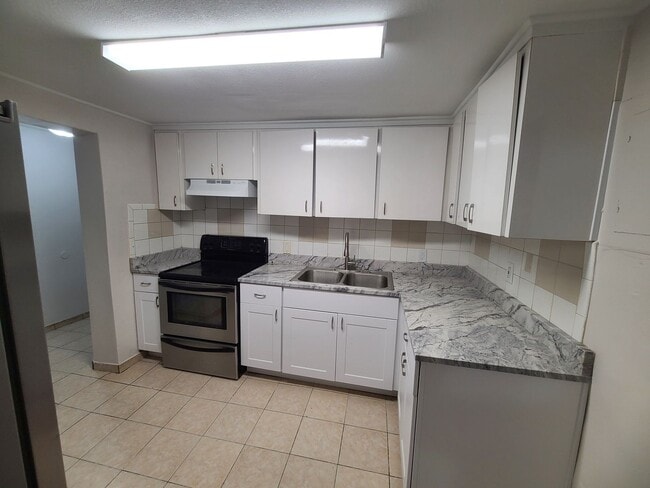 Photo - BRAND NEW RENOVATION! Spacious 5-Bed/2-Bat...