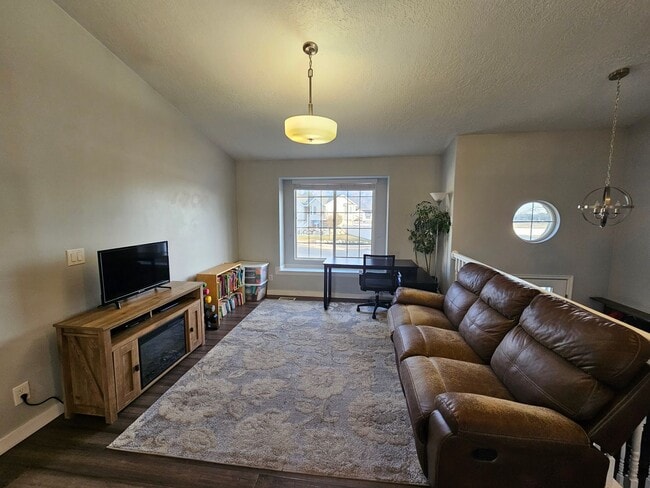 Photo - Spacious 4-Bed, 2-Bath Pet-Friendly Home with Central Air & 2-Car Garage! - Available NOW!