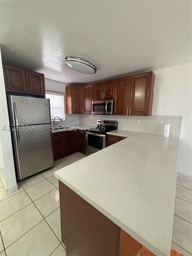 Building Photo - 6850 W 16th Dr Unit 316
