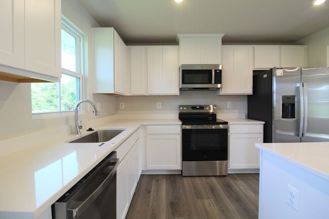 Photo - Never-Lived-In Luxury: Modern 3-Level Living + Garage in Orchard Ridge