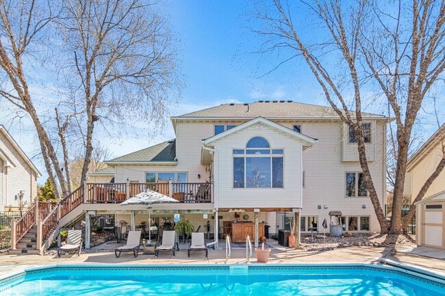 Photo - Luxury 4-Bed Retreat with In-Ground Pool & 3-Car Garage