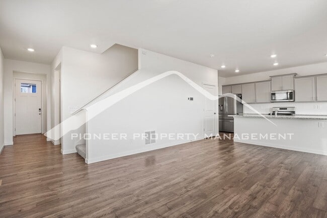 Photo - Modern 4-Bed, 2.5-Bath Home with 2 car garage, AC and Private Enclosed Yard